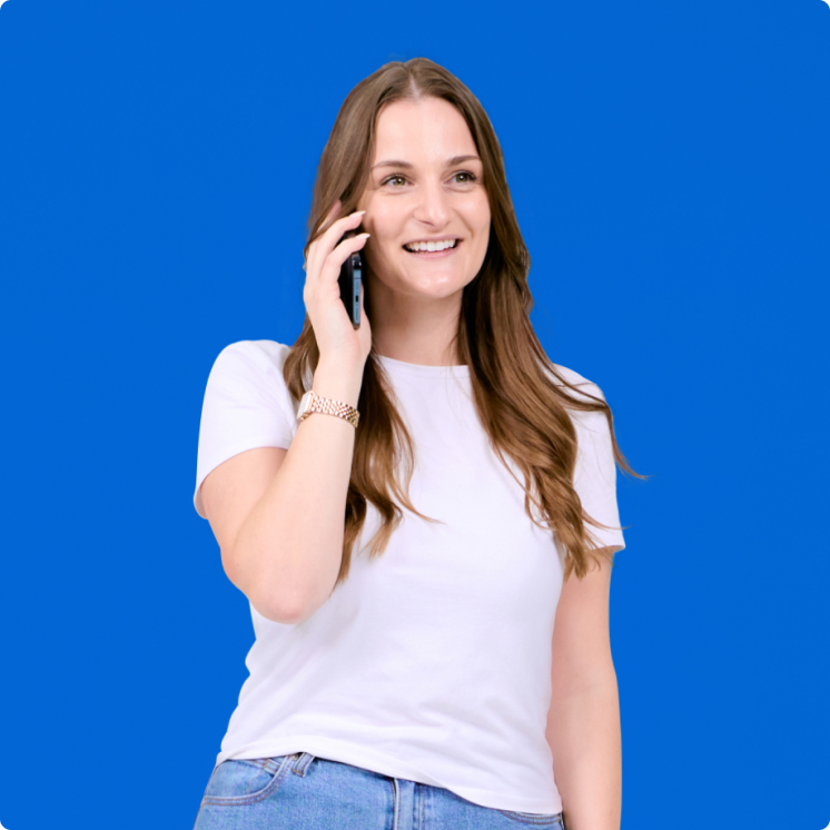 customer-suppoert-img A woman talking on a cell phone against a blue background.