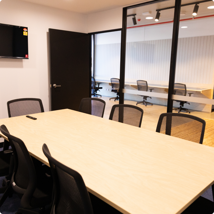 worklocal-img5 A conference room with a table and chairs.