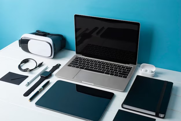 electronics 1 electronic devices lined up on desk
